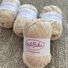 4 skeins of Knit Picks fingering/sock yarn Ivory color B983