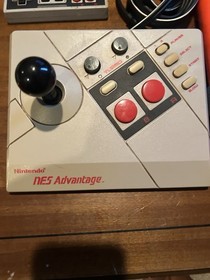 Nes Advantage, light gun and 1 Controller.