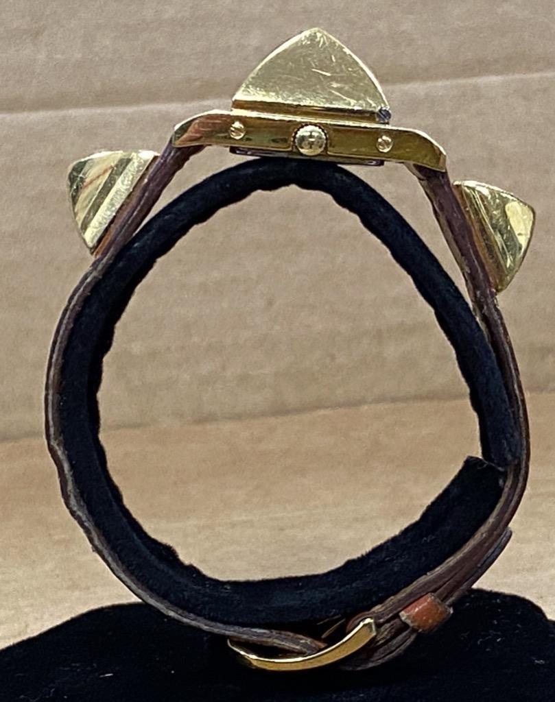 HERMES MEDOR PYRAMID GOLD STUDS WHITE DIAL 23mm QUARTZ  display picture 3