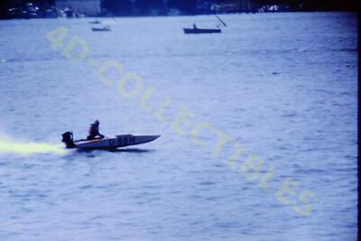 Vintage Slide Photo Boat Speeding Across Calm Blue Waters
