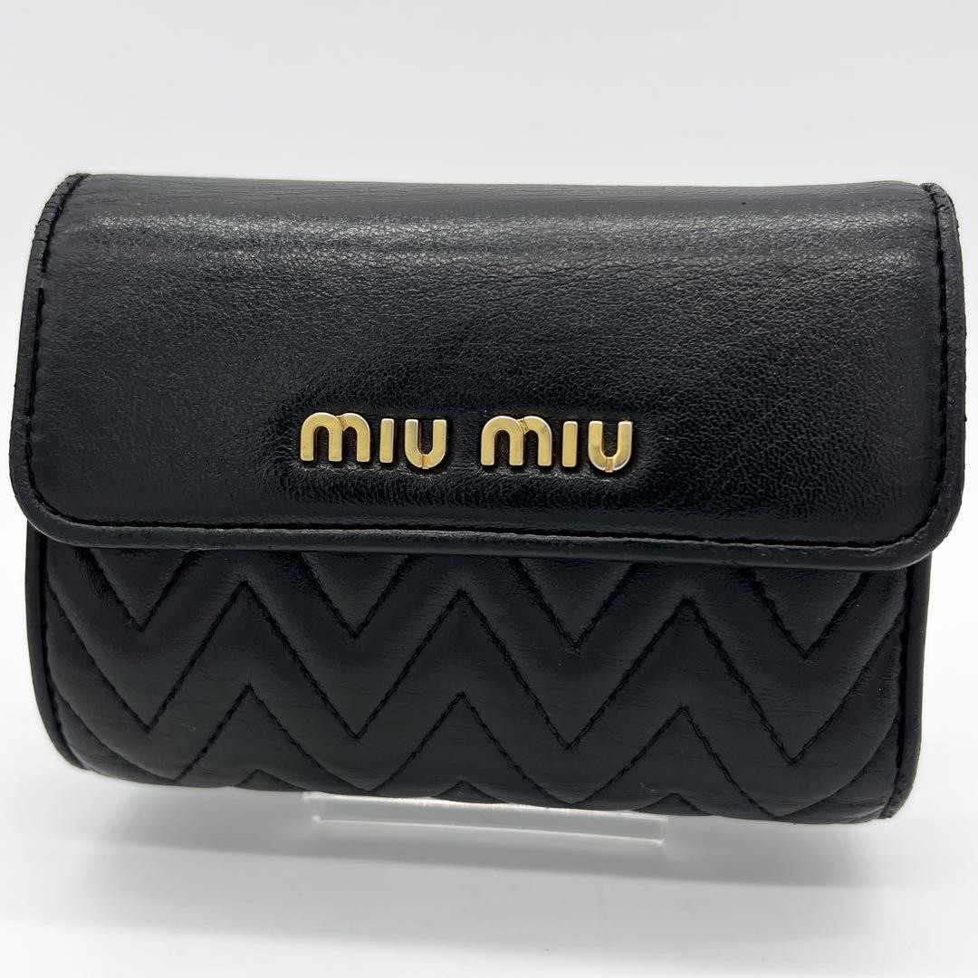 Miu Miu Leather Foldable Wallet with L-shaped zip Black from JP