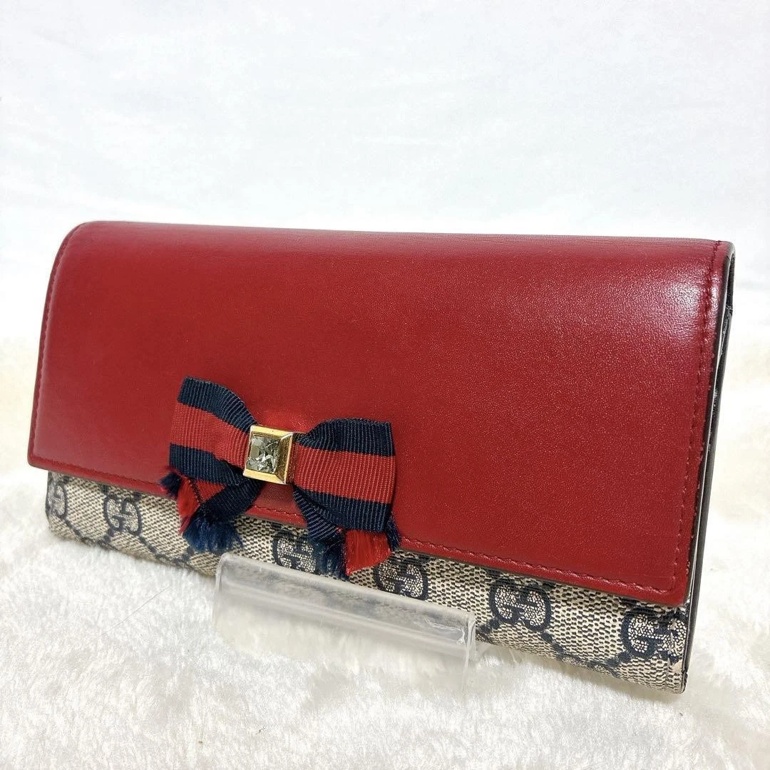 Portefeuille long Gucci GG Supreme ruban cuir rouge 19x9 cm occasion