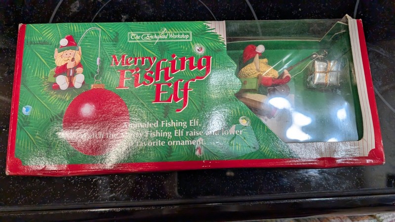 1992 Enchanted Workshop Merry Fishing Elf Animated Holds Christmas Tree Ornament