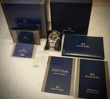 Grand Seiko SBGJ203 (9S86‑00A0) — Hi-Beat GMT Mastery in Steel 9