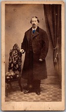Antique CDV Circa 1860s Unmarked Handsome Man Wearing Long Coat