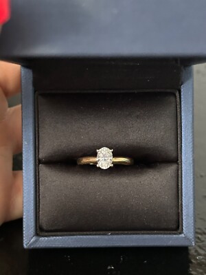 1 carat oval cut solitaire, yellow gold and white gold engagement ring 