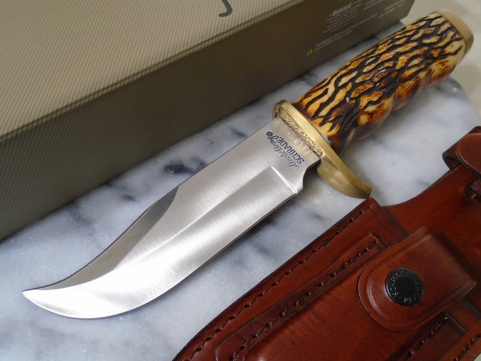Cuchillo de hoja fija Schrade Uncle Henry Pro Hunter Clip Point Bowie cuero 171UH Foto 3 de 4