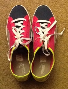 pink and yellow pumas