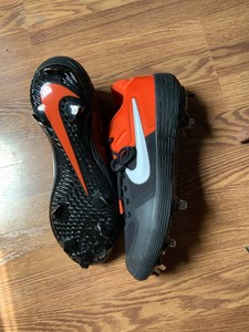 orange metal baseball cleats