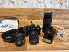 Minolta Maxxum 9000 AF SLR. comes with lens and flash - untested