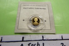QUEEN ELIZABETH II OF BRITAIN COAT ARMS .5 GRAM $10 14KT .585 GOLD COIN COA 5QE5 5595.52 per troy oz