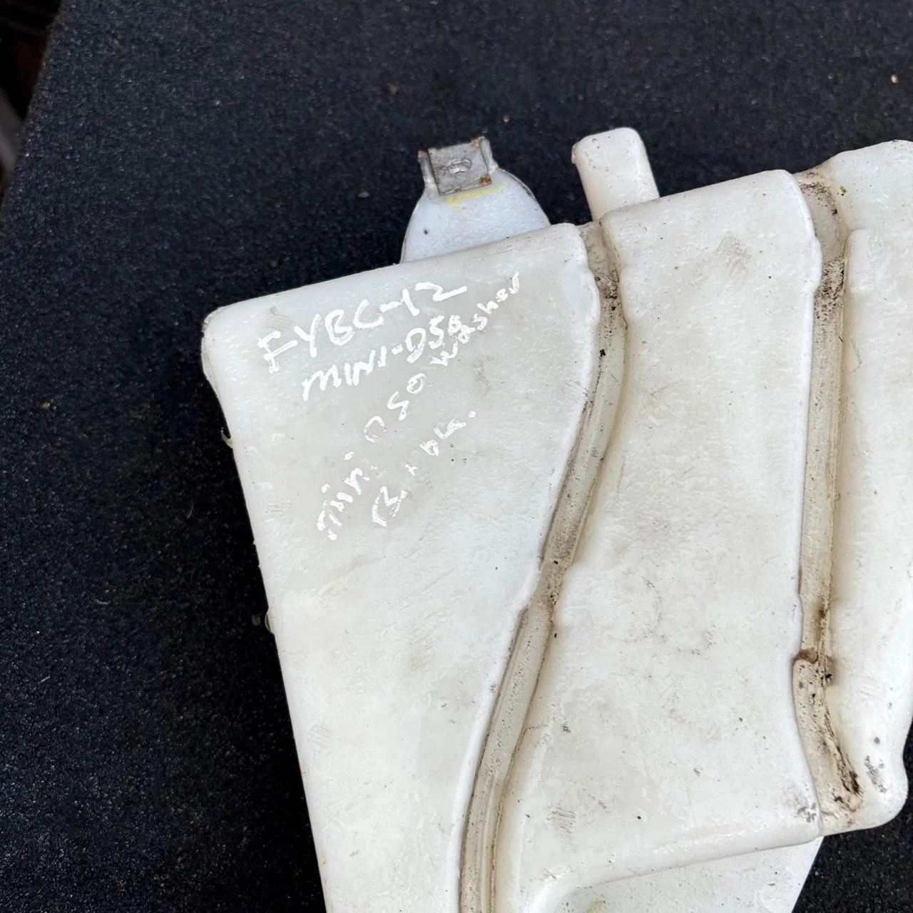 Pump label close-up part numbers