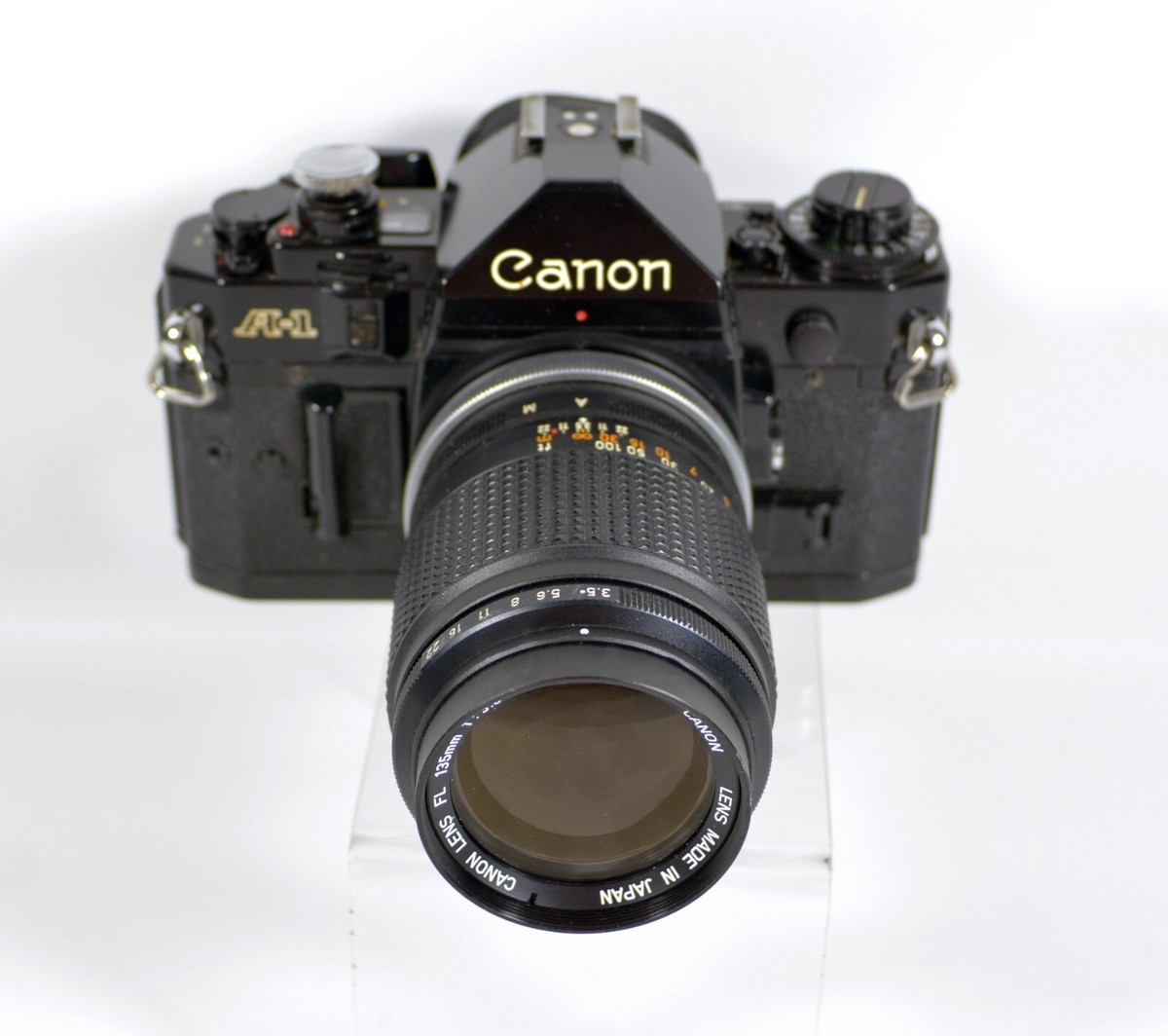 Canon A-1 35mm SLR Black Camera w/Canon FL 135mm f/3.5 Lens [EXC