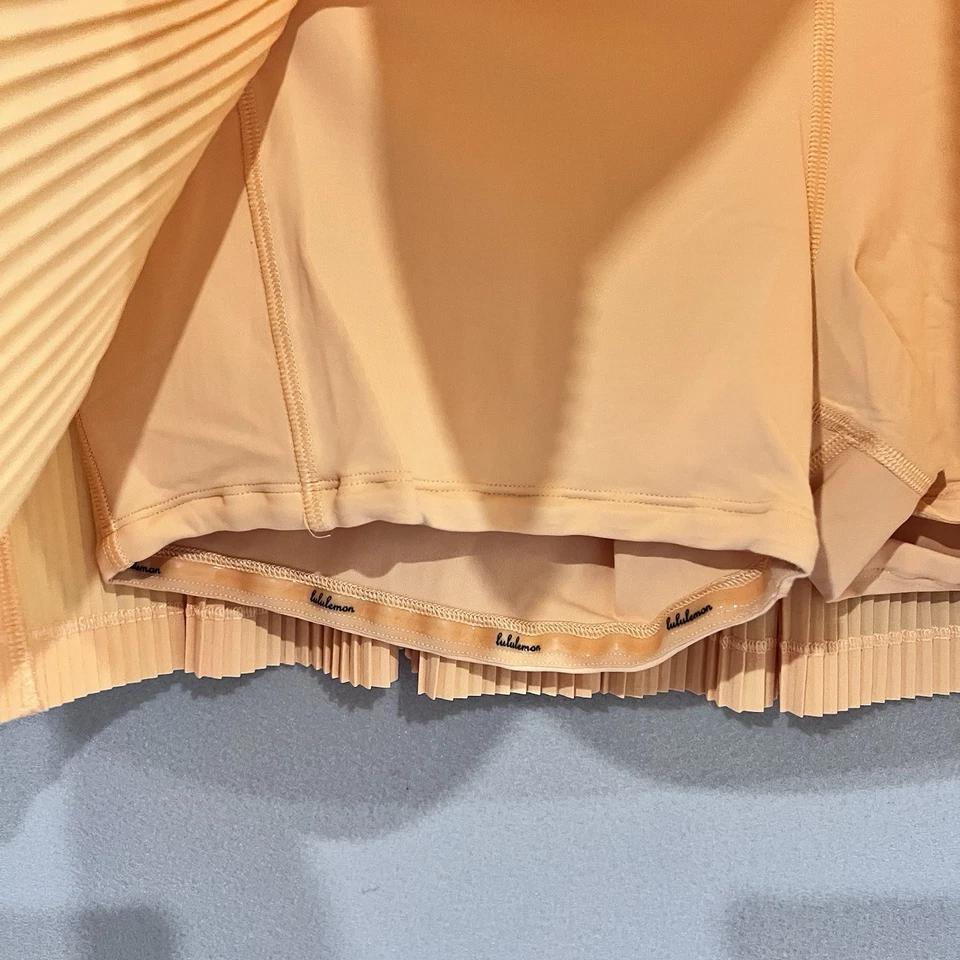 Saia Skort Lululemon Feminina 10 Laranja Plissada para a Rua II Tênis Pickleball - Imagem 3 de 4