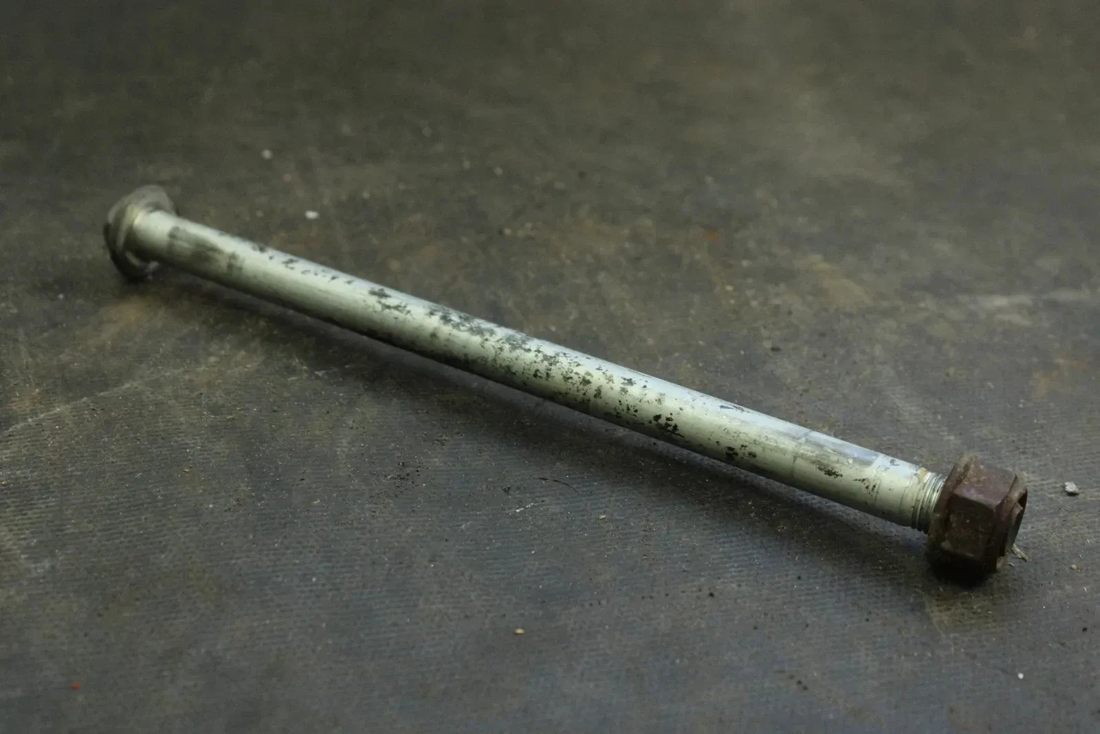 2004 Honda CRF150F OEM Swingarm Bolt 52101-KPS-900 B4469