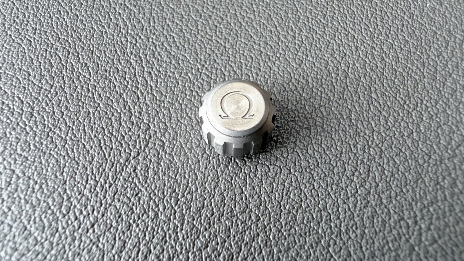 OMEGA titanium crown for the Speedmaster