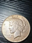1934-S Peace silver dollar. XF-AU. 80% mint luster. Pretty. No reserve.