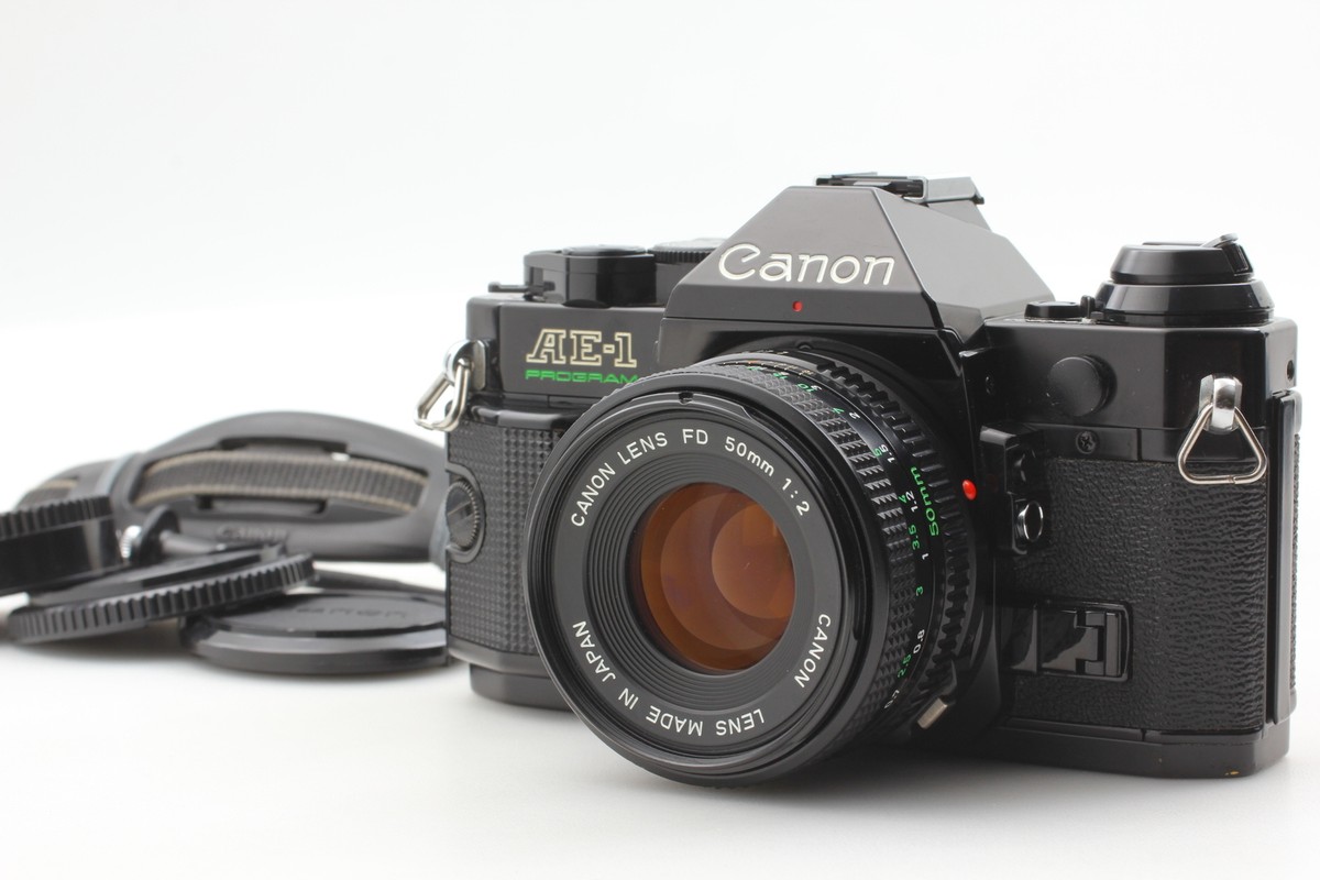 キャノン　Canon AE-1 PROGRAM + NEW FD 50mm F2 MINT] Canon AE-1 P Program 35mm Film Camera New FD NFD 50mm
