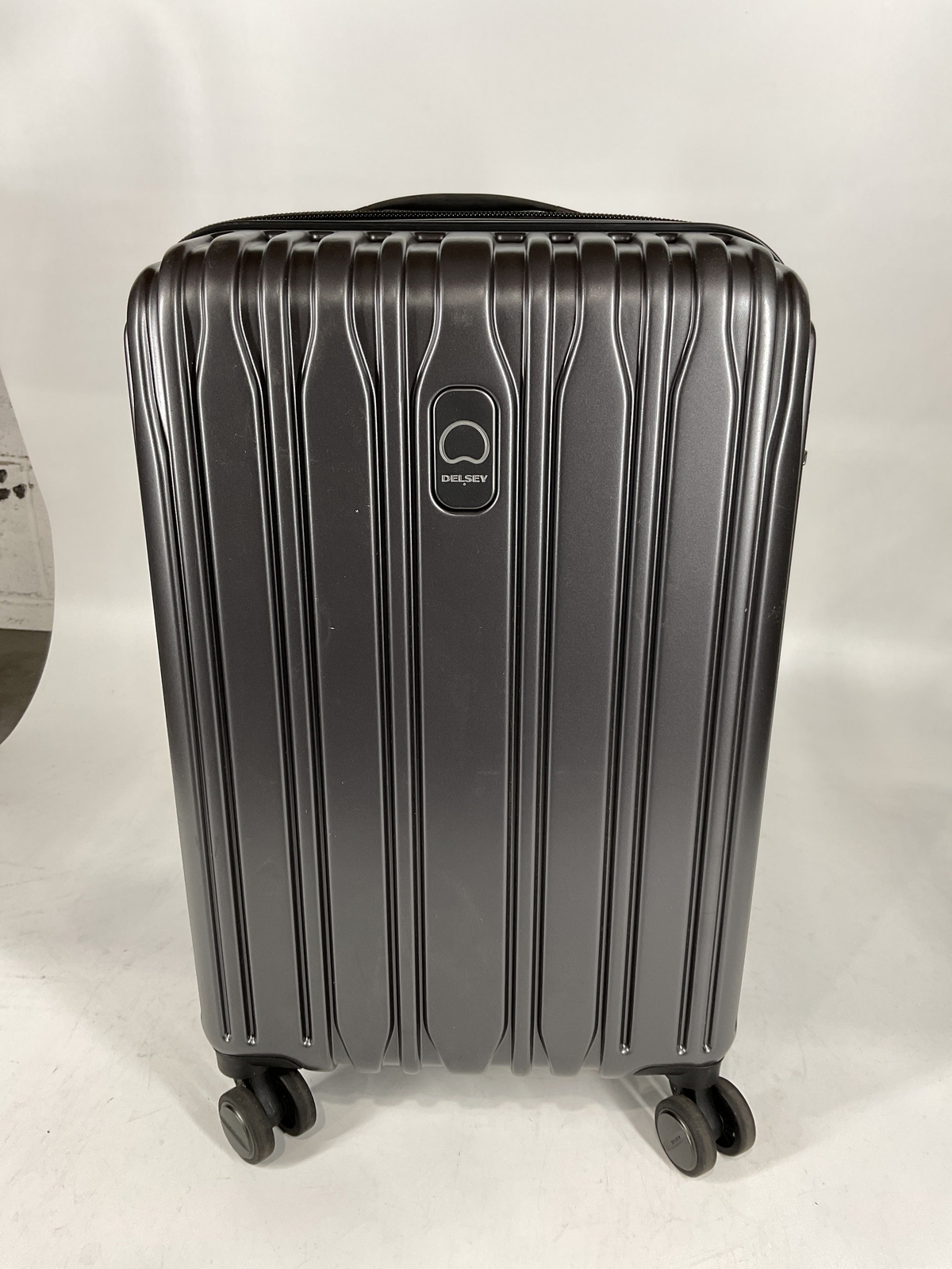Delsey Paris Chromium Lite 21Inch Spinner CarryOn W… Gem