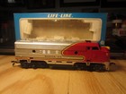 HO trains; Mint in box LIFE LIKE SANTA FE F7 A unit--has a gear issue
