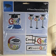 New 6 Piece Graduation Decoration Kit. Unopened Package. Multicolored