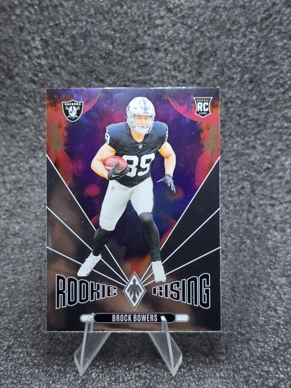2024 Panini Phoenix - Rookie Rising Brock Bowers #RR-BBS Lazer (RC)