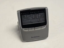 Brookstone Atomic Travel Alarm Clock Desktop Office Light Up Touch 