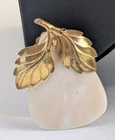 Miriam Haskell Mother of Pearl and Gold tone Brooch