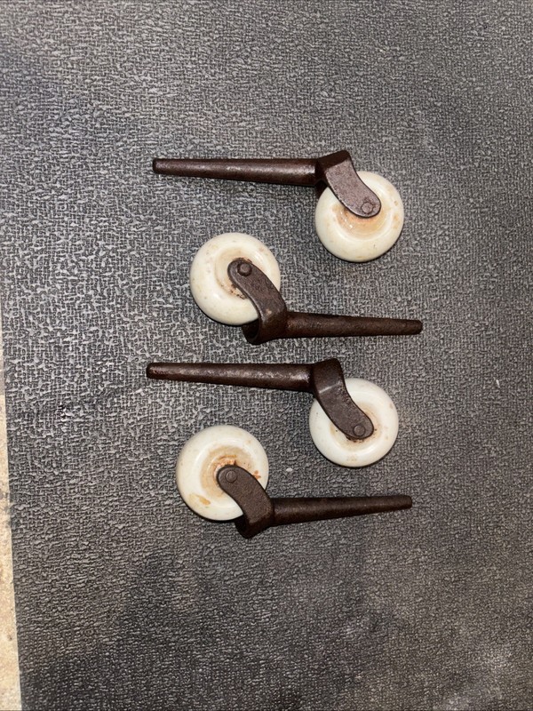 SET OF 4 ANTIQUE PORCELAIN FURNITURE CASTERS 1-9/16" DIAMETER 3" SHAFT