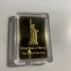 Statue Of Liberty torch eagle flag One Troy Ounce Bar .999 Fine Gold Clad  MINT