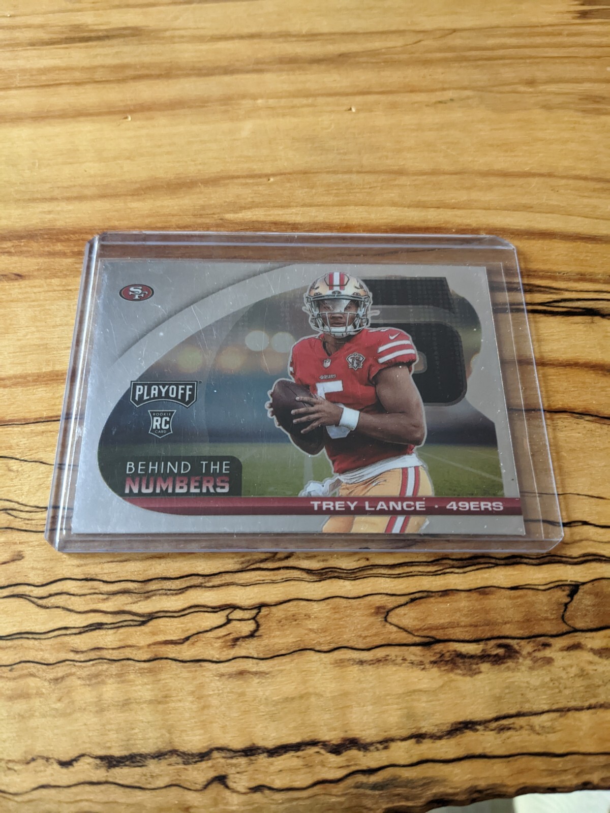 2021 Panini Playoff - Behind The Numbers Pink Prizm #BTN-TLA Trey Lance (RC)