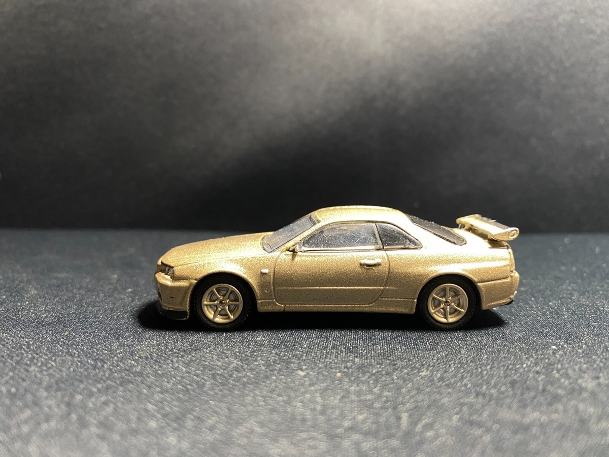 1/64 NISSAN SKYLINE GT-R (R34) LITR GOLD | eBay