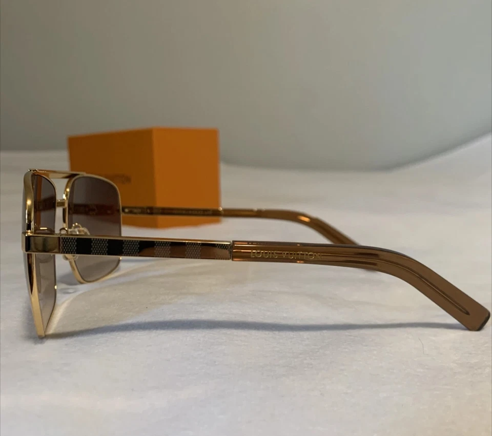 GAFAS DE SOL USADAS LOUIS VUITTON ACTITUD PILOTO PLATEADAS Z0340U M-B7B8 Foto 3 de 4