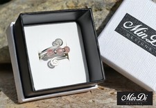 Handmade sterling silver adjustable wire ring with Rose Quartz.