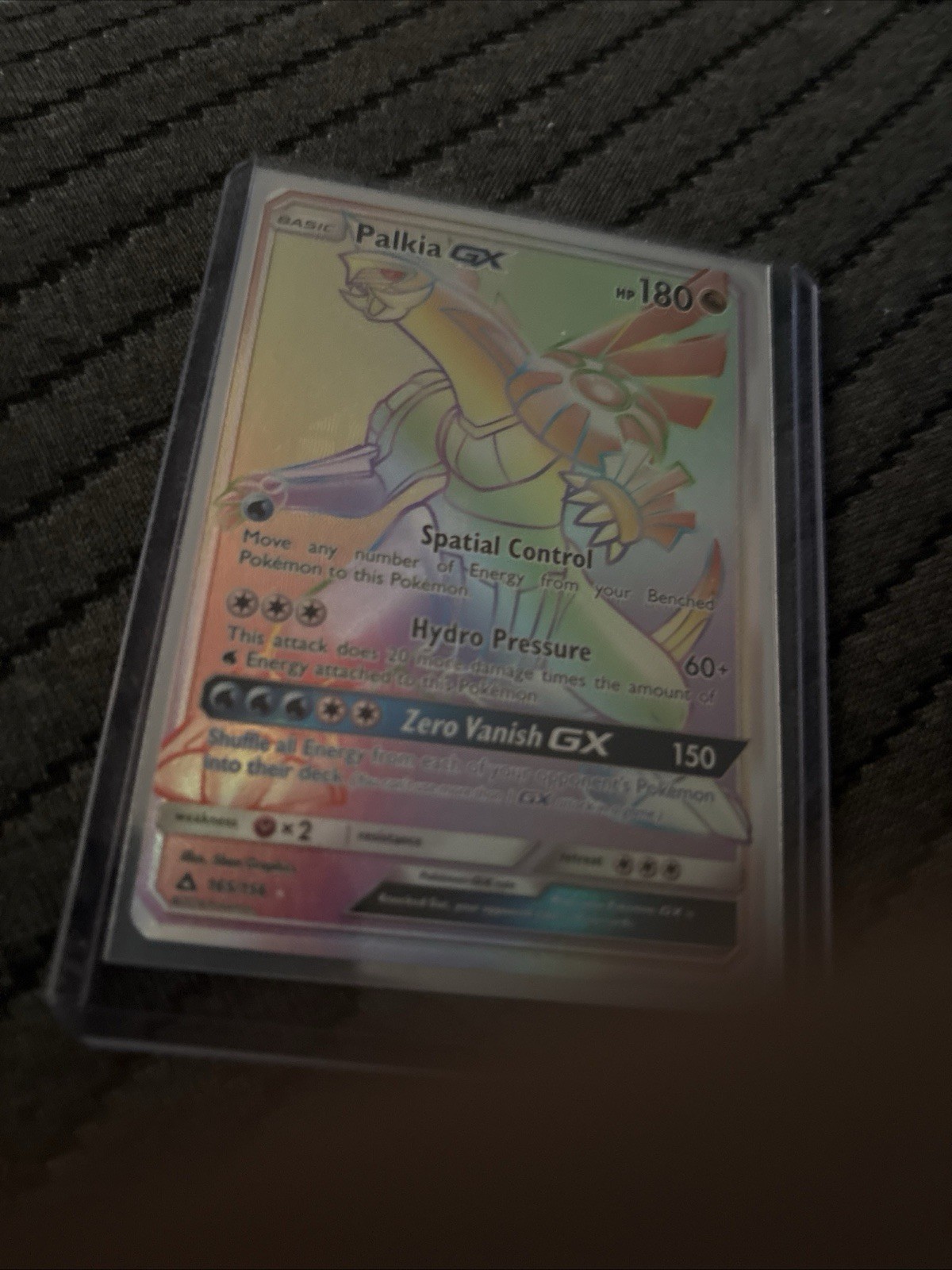 Palkia GX Secret Rare 132/131 SM-Forbidden Light Holo 180HP (off centered)
