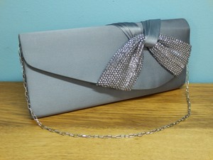 grey satin clutch bag