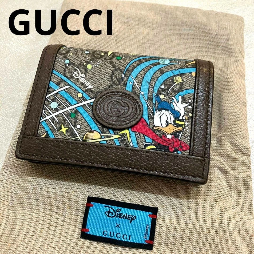 Portefeuille pliant Gucci Disney Donald Gg Supreme m1_0428