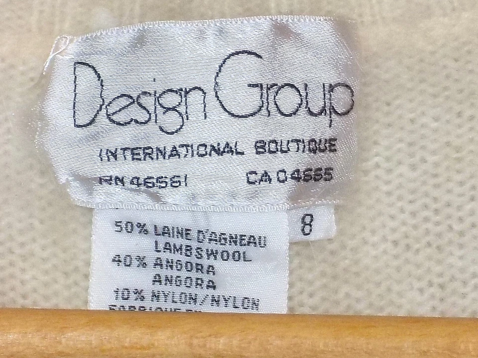 Vestido midi tejido de colección lana de cordero/angora/nylon crema falda acanalada cuello en V cable difuso Foto 4 de 4