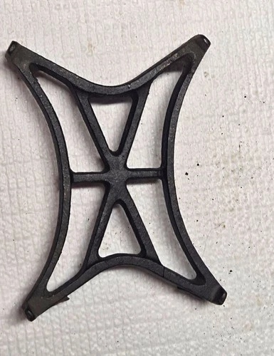 Antique cast iron geometric sad iron trivet, X  and hourglass design - product listing photo