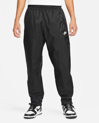 Pantalon doublé tissé homme Nike Windrunner noir blanc DX0653 011