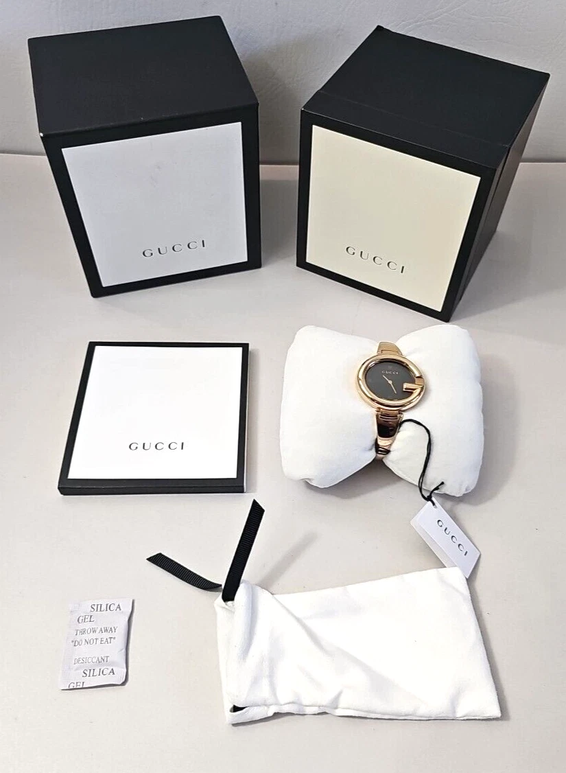 Montre GUCCI 134.3 YA134303 ~ Bracelet ~ Femme ~ Ton or ~ Occasion ~ En l'état