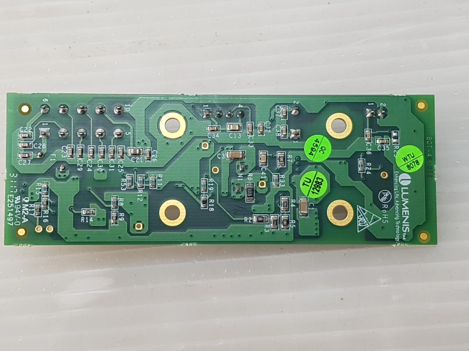 Solder side of the Lumenis PC-10009821 board with Lumenis and RoHS markings
