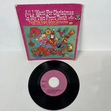 All I want for Christmas is my two front teeth Mr. Pickwicks extended play...