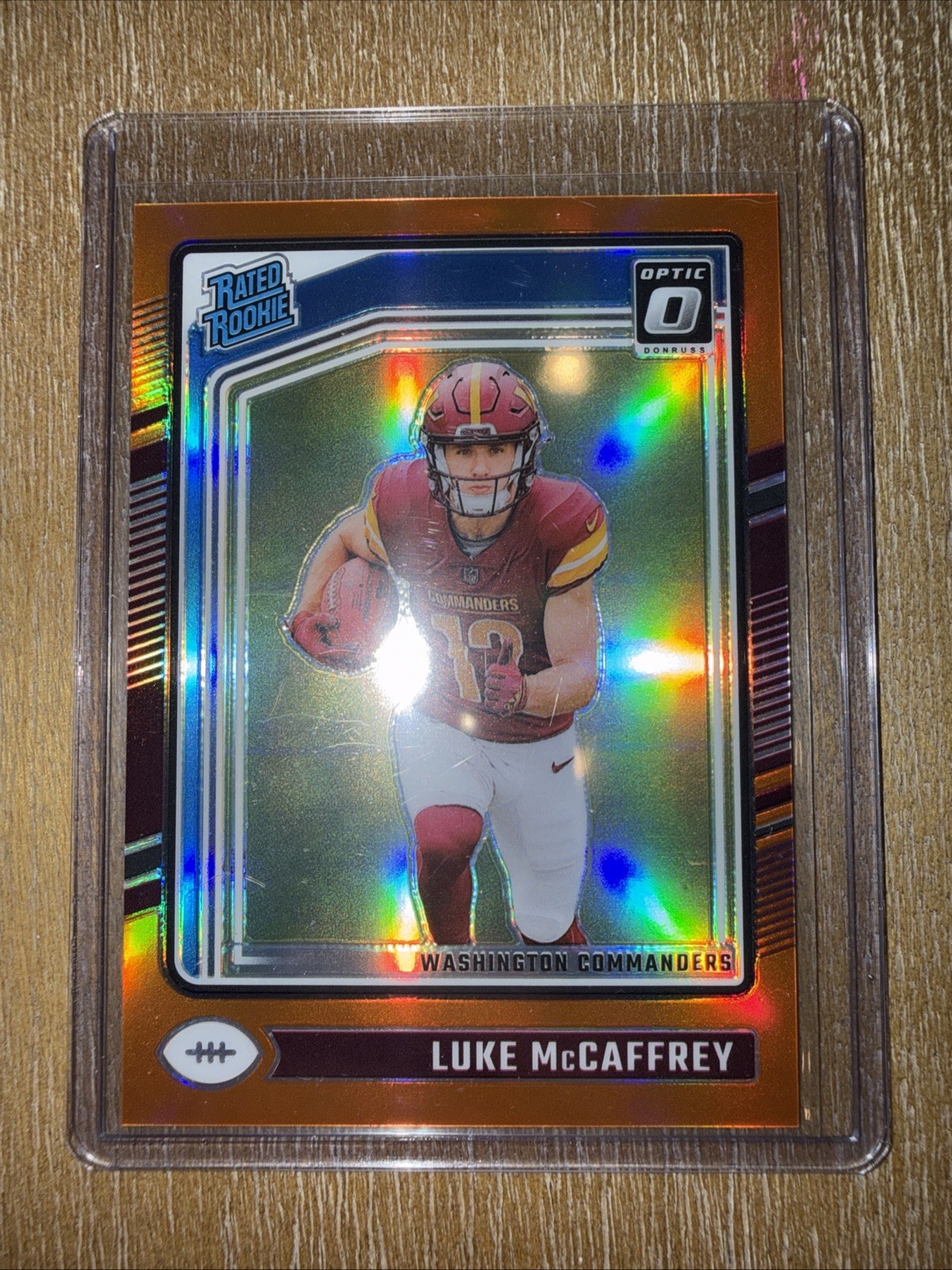 2024 Panini Donruss Optic - Rated Rookie Luke McCaffrey #268 Orange Prizm /249  