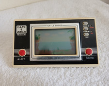 ebay® Auktion 188400205809 | Nintendo CGL Game & Watch Turtle Bridge Widescreen 1982 TL-28 getestet und funktionsfähig Thumbnail of ebay® auction 188400205809 | Nintendo CGL Game & Watch Turtle Bridge Widescreen 1982 TL-28 getestet und funktionsfähig