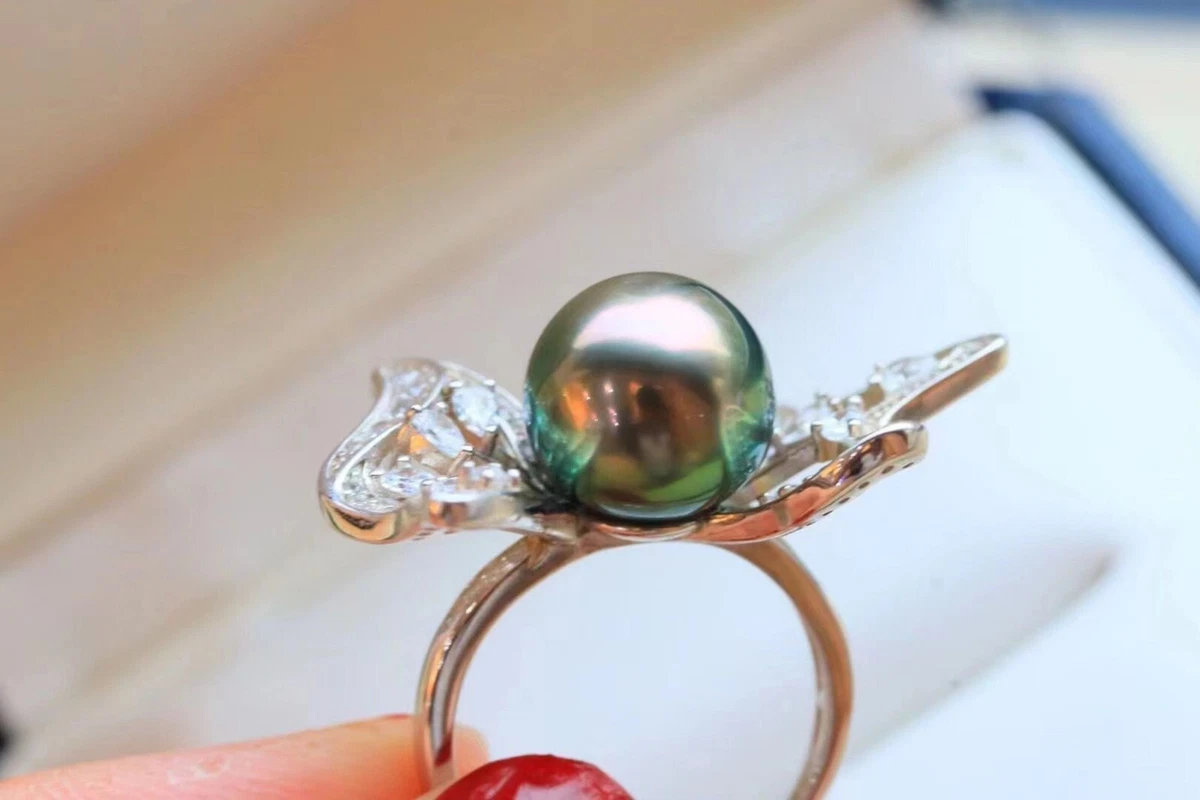 Green pearl best sale ring