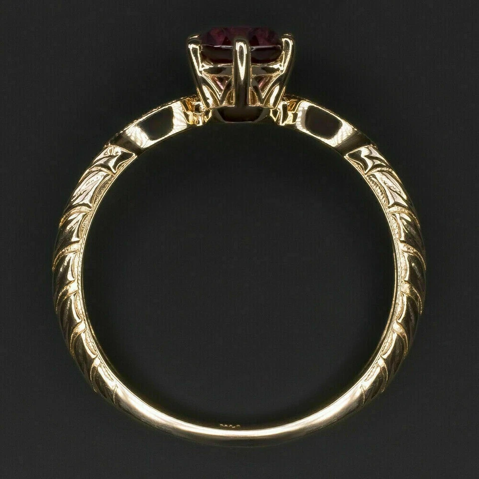 Anillo de compromiso para mujer granate rojo simulado corte ovalado de 2 quilates acabado oro amarillo de 14 k Foto 2 de 4