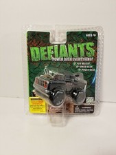 Rare 2013 Sealed DEFIANTS Black 4X4 Monster Tow Truck Stompers Rednex vs Rally