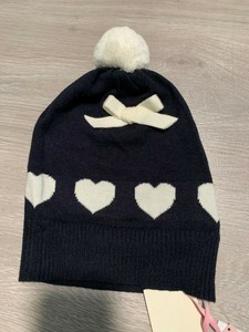 pom pom hat designer