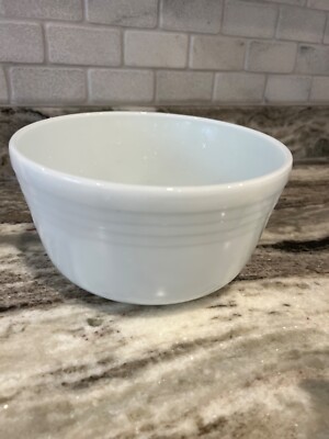 pyrex mixing bowl. White with some marks inside. Outside is in perfect condition